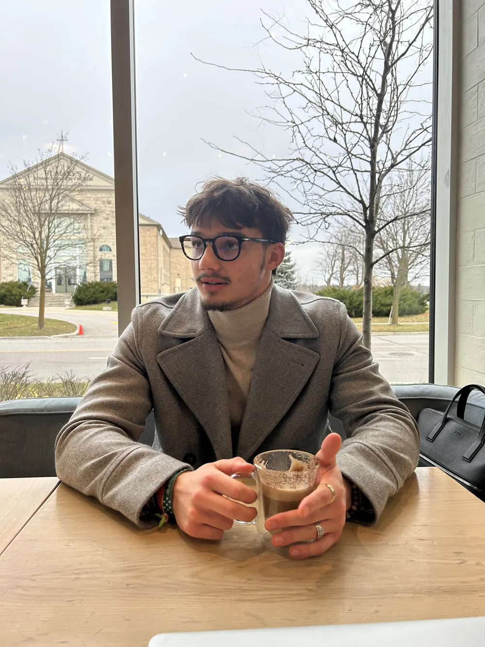 George at a cafe table